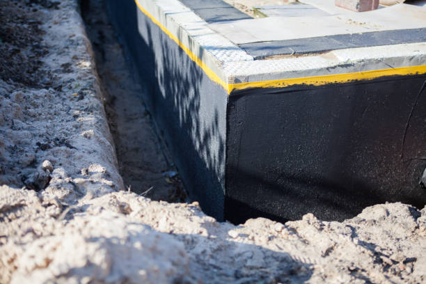 Professional Emergency Waterproofing technician working in Colden, NY